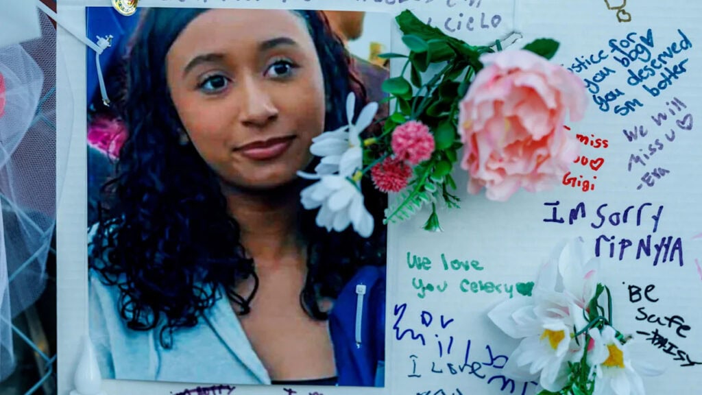 A photo of Celeste Rivas Hernandez, flowers, and writing as part of a memorial